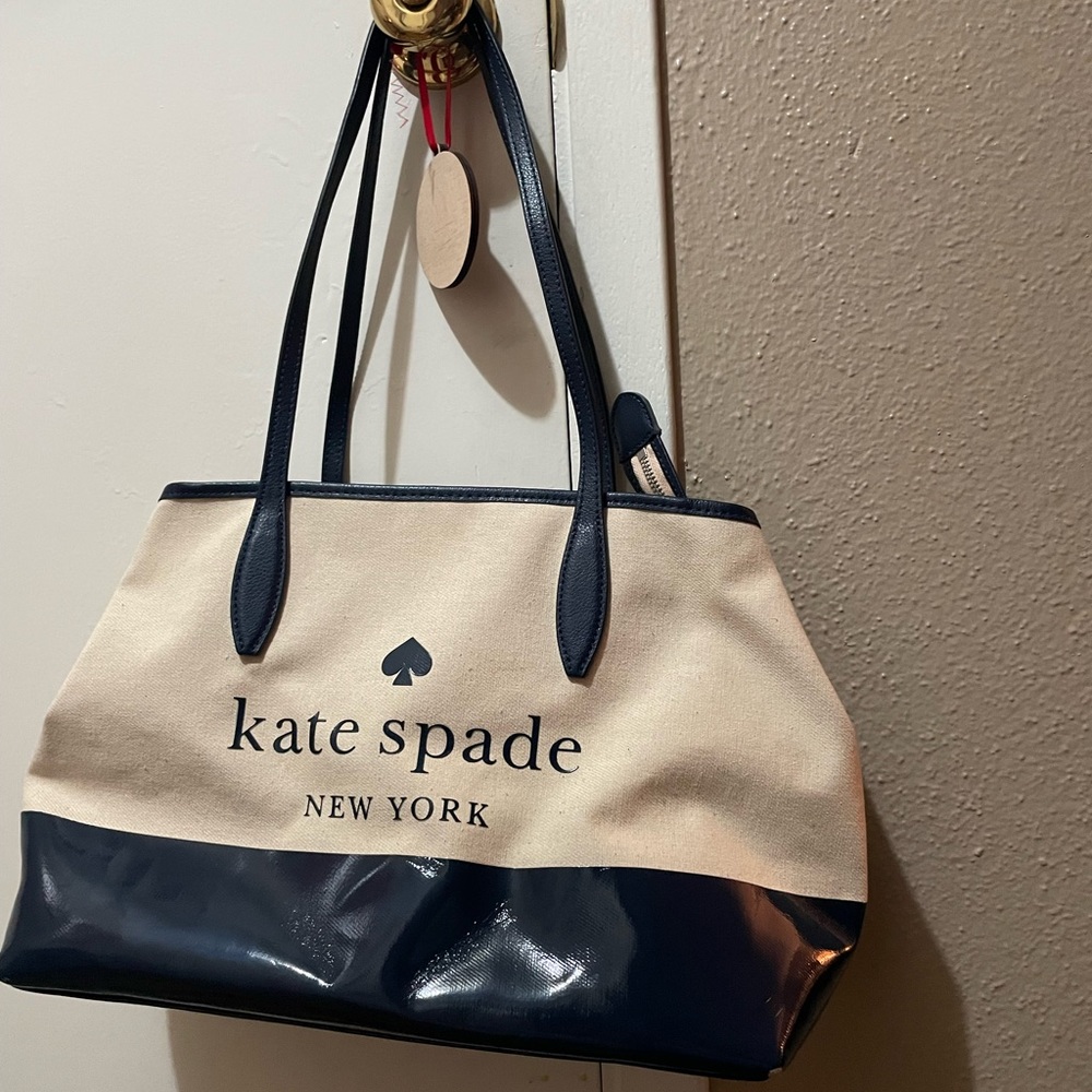 Kate spade shoulder bag with navy on bottom with canvas on top